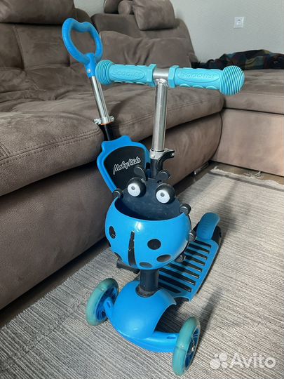 Самокат с сидением и ручкой