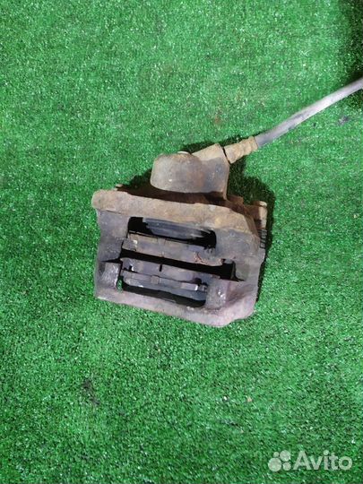 Тормозной суппорт передний правый Renault Logan