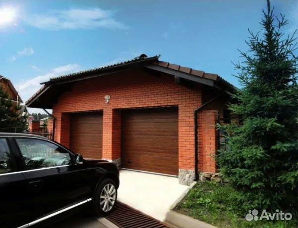 Гаражные секционные ворота дорхан