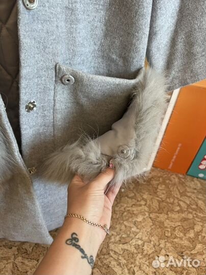 Пальто с меховыми карманами