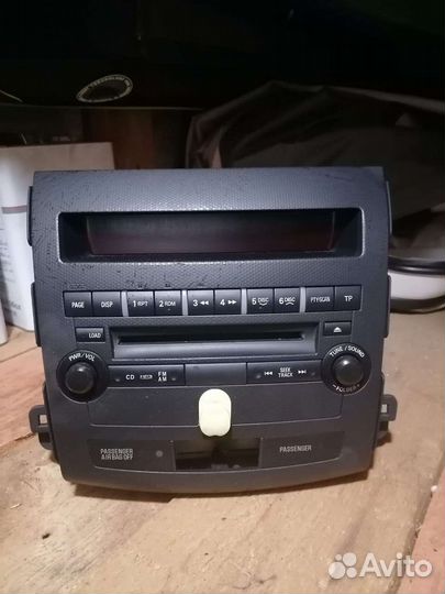 Магнитола и панель управления Mitsubishi outlander