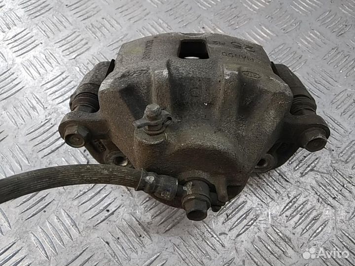 Суппорт передний правый Hyundai Elantra