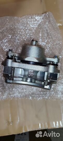 Суппорт передний левый Nissan Safary Y60