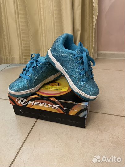 Роликовые кроссовки heelys