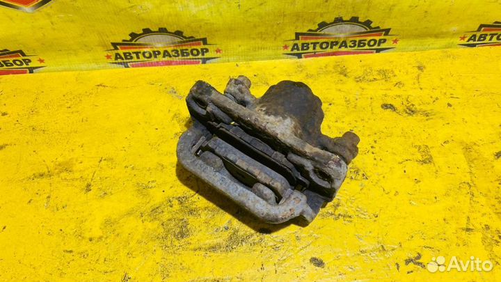 Суппорт задний правый Nissan Qashqai J10