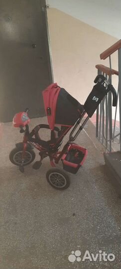 Детский велосипед с тростью BMW