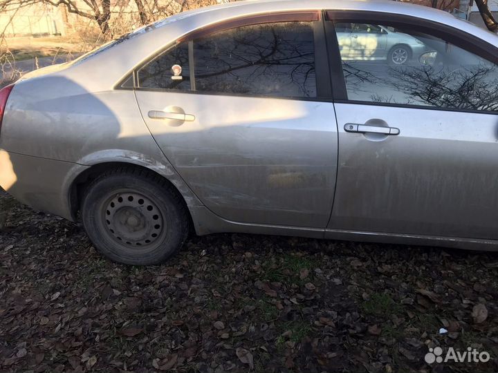 Двери nissan primera P12