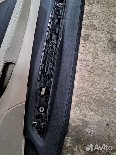 Обшивка двери на BMW F01