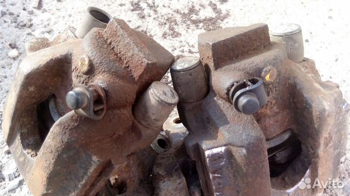 Суппорт тормозной передний - задний BMW E34