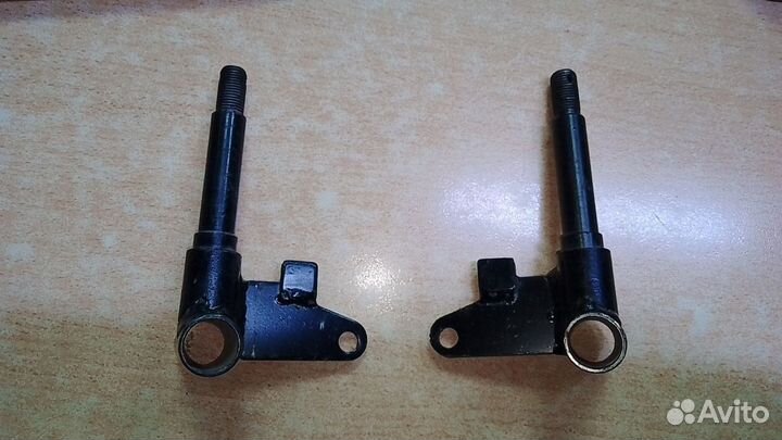 Кулак рычаг поворотный верхний Рысь 110