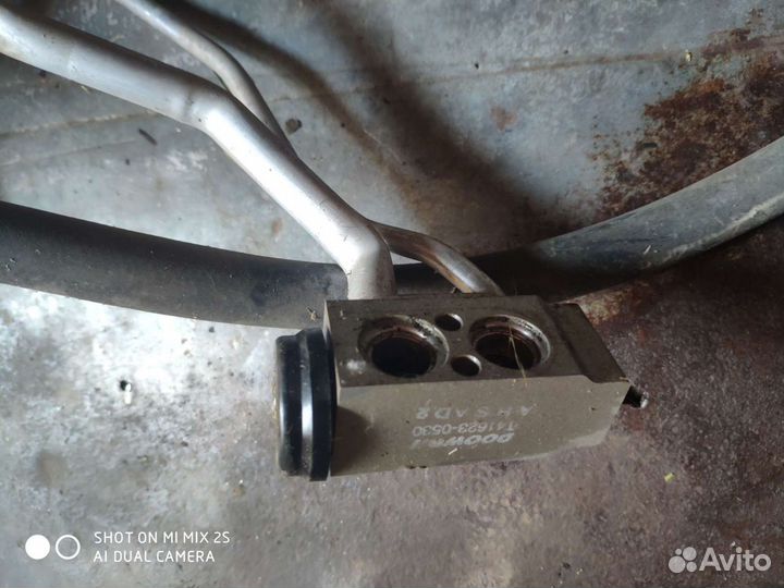 Трубка кондиционера с клапаном трв на Киа Серато