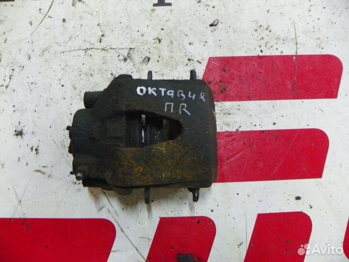 Суппорт тормозной передний правый Skoda Octavia