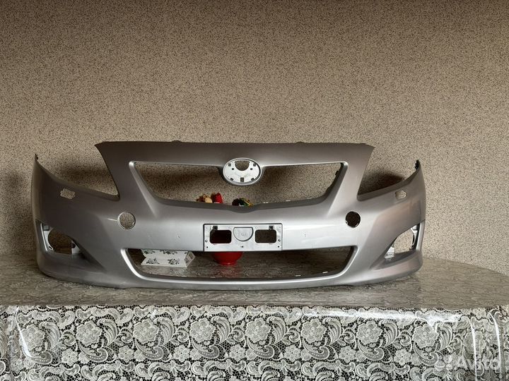 Бампер передний на toyota corolla 150