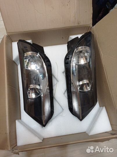 Фары volkswagen tiguan Hella Чехия 1EL010749221