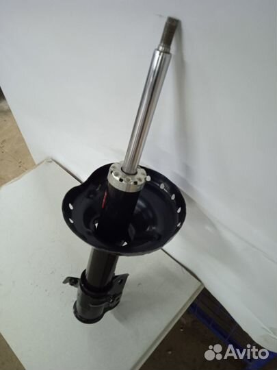 Амортизатор передний лев Subaru Legacy 2003-2009