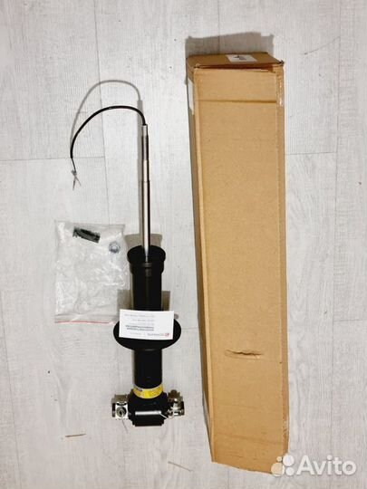 Амортизатор Cadillac