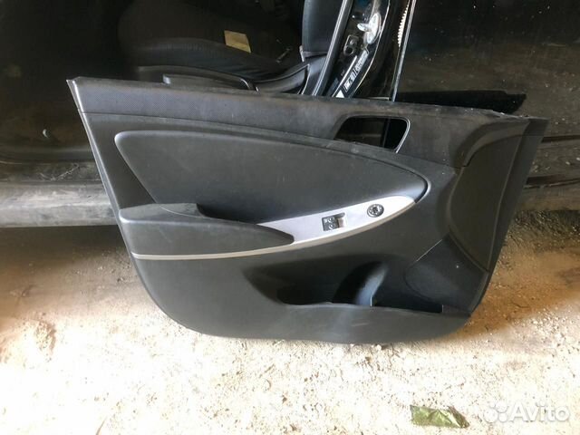 Обшивка двери передняя левая Hyundai Solaris