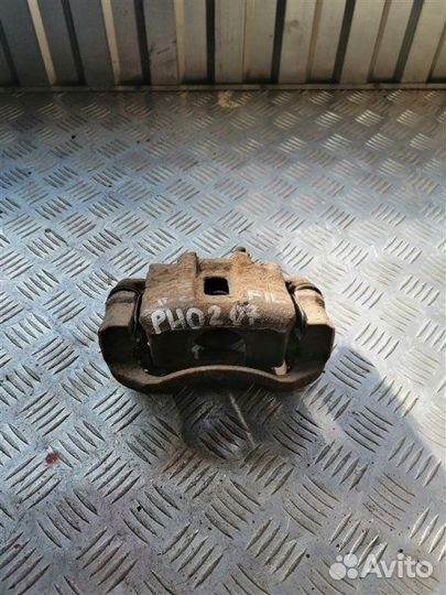 Суппорт тормозной передний левый Kia Rio 2 JB G4EE