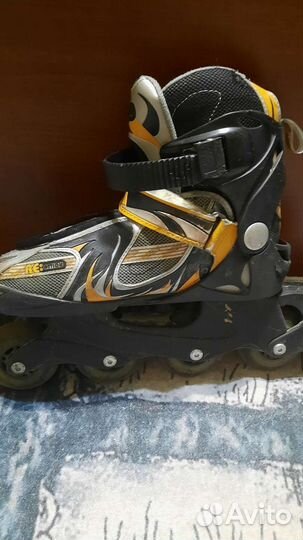 Роликовые коньки