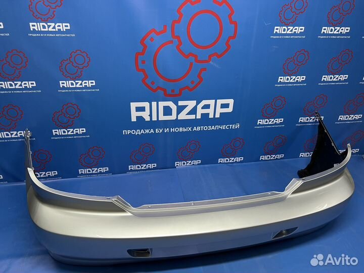 Бампер задний Kia Spectra