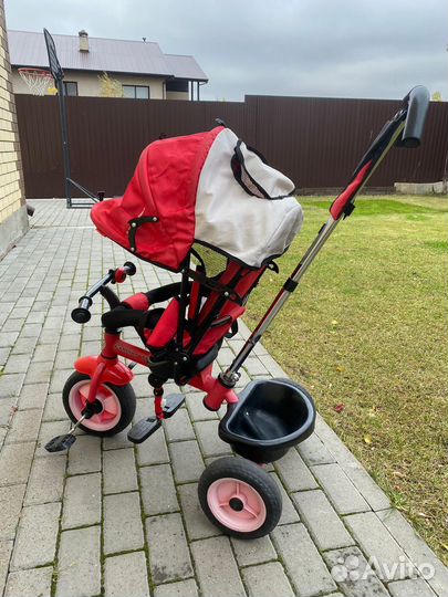 Трехколесный велосипед с ручкой