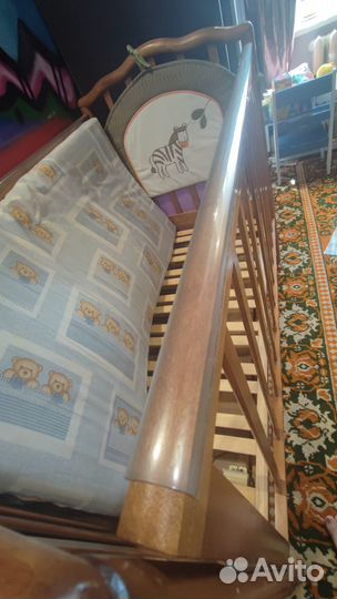 Детская кроватка можга с маятниковым механизмом