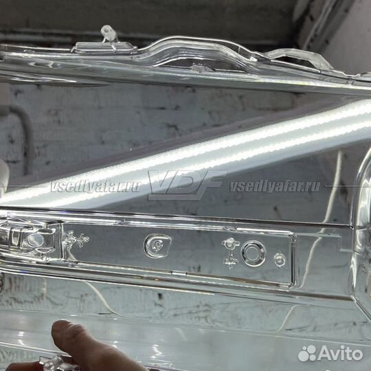 Уцененное стекло для фары Toyota Land Cruiser 200