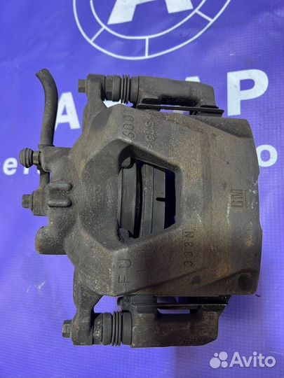 Суппорт передний левый Opel Astra J A16XER 2012