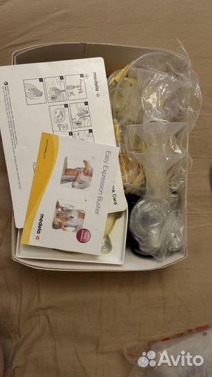 Молокоотсос Medela двойной Swing Maxi and calma