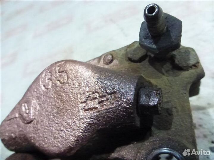 Суппорт задний левый Opel Omega F35 C20NE