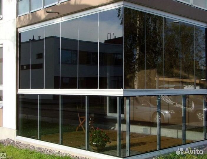 Безрамное раздвижное остекление