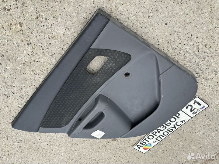 Обшивка двери задняя левая Kia Rio 2