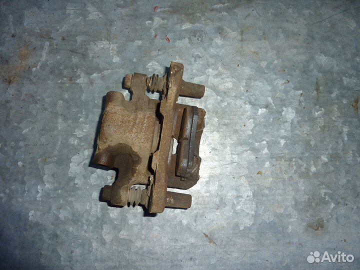 Mitsubishi Lancer X 10 суппорт задний в сборе