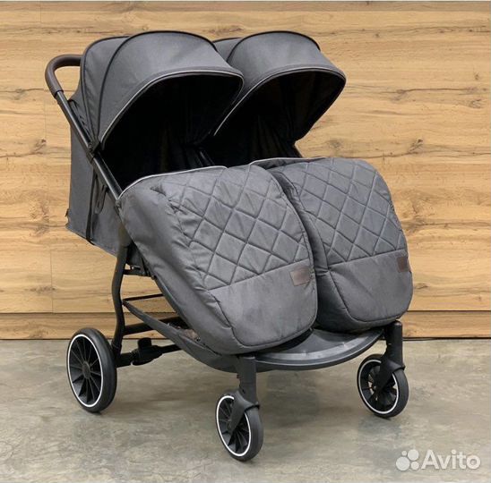 Коляска для двойни погодок