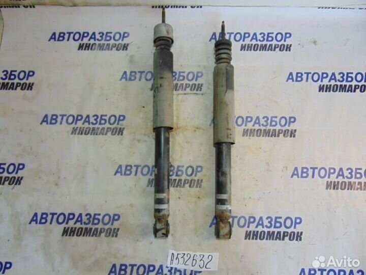 Амортизатор задний для Nissan Tiida 1 2004-2014г