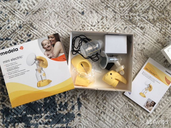 Молокоотсос medela электрический