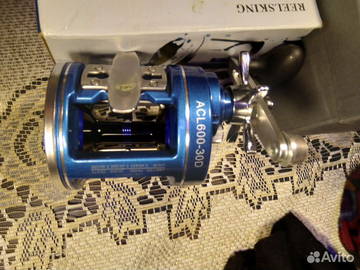 Спиннинг и катушка для троллинга новые