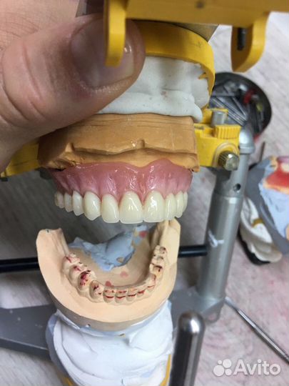 Зубной техник