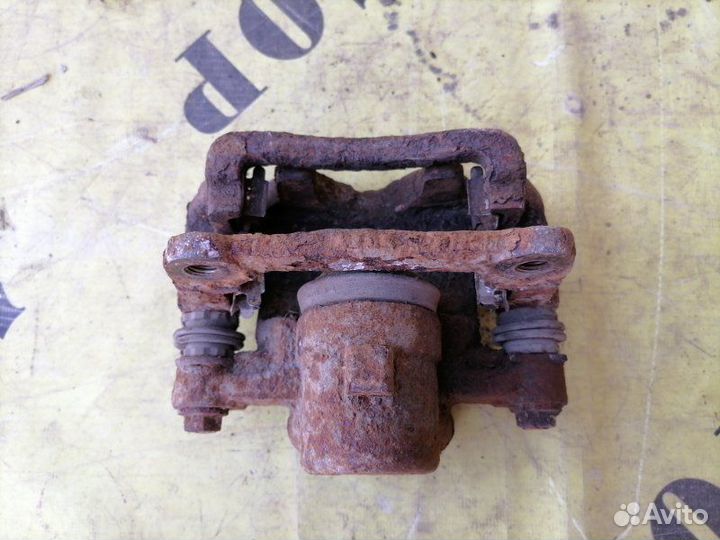 Суппорт задний правый Toyota Corolla 120 2001-2006