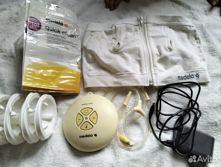 Молокоотсос Medela swing maxi flex