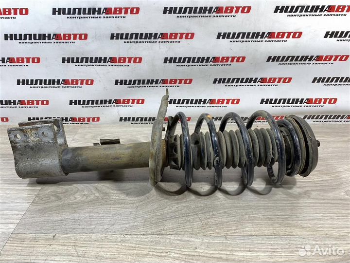 Амортизатор передний левый Пежо 308