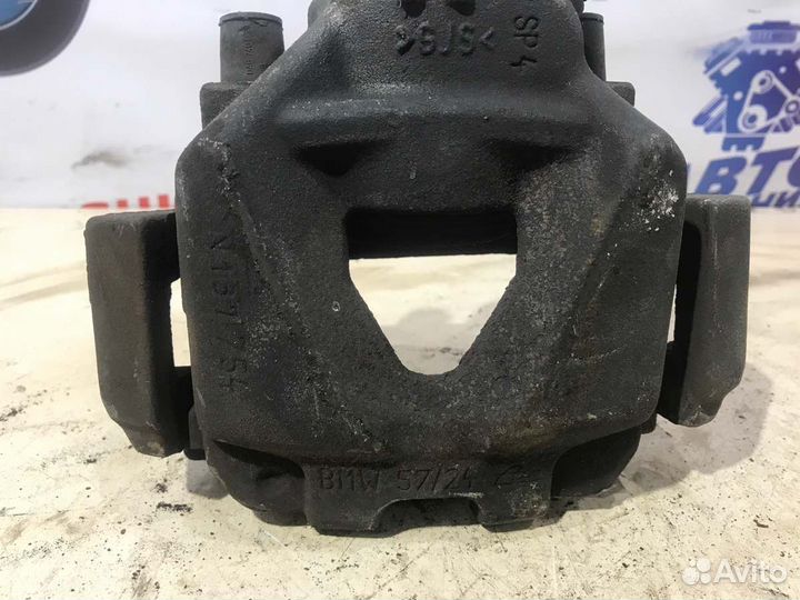 Суппорт тормозной передний левый Bmw X1 E84