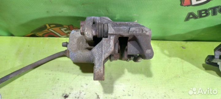 Суппорт тормозной передний правый Renault Logan 1