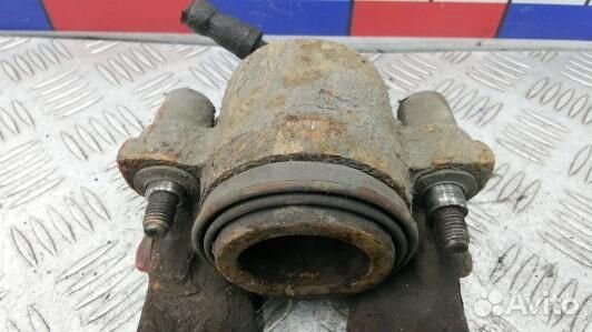 Суппорт тормозной передний левый volkswagen jetta