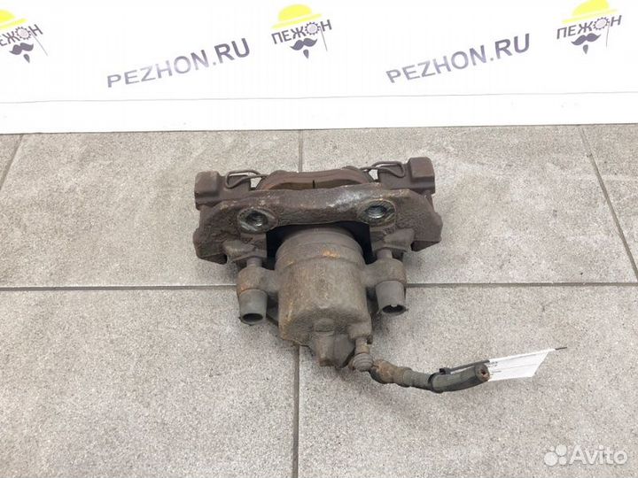 Суппорт тормозной передний левый Ford Focus