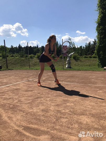 Тренер по большому теннису