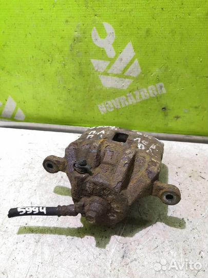 Суппорт передний левый Хендай Элантра 3