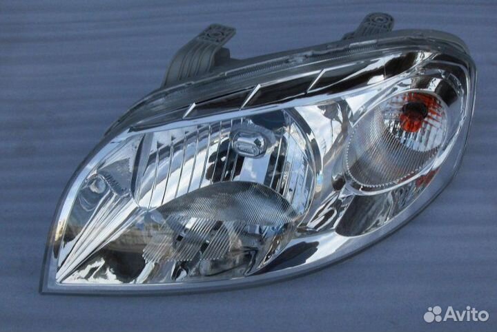 Фара левая с корректор передняя левая Chevrolet