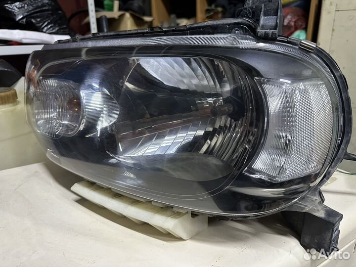 Фары Nissan Cube