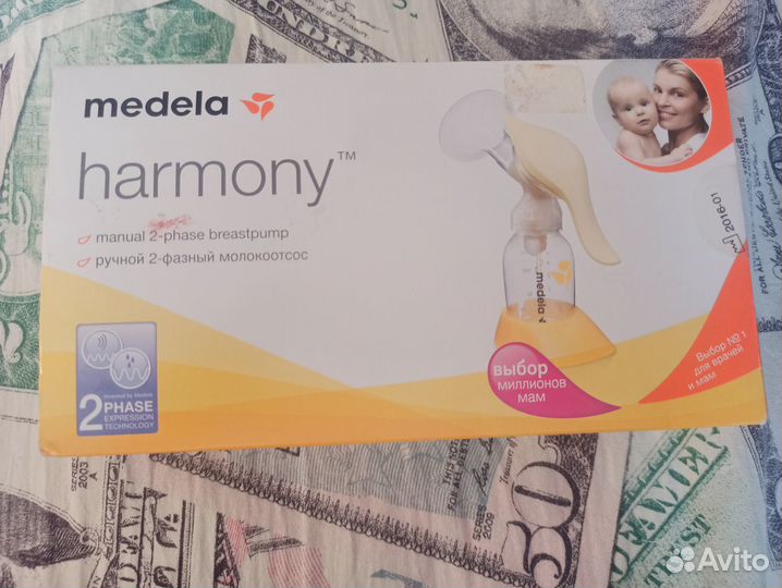 Молокоотсос medela